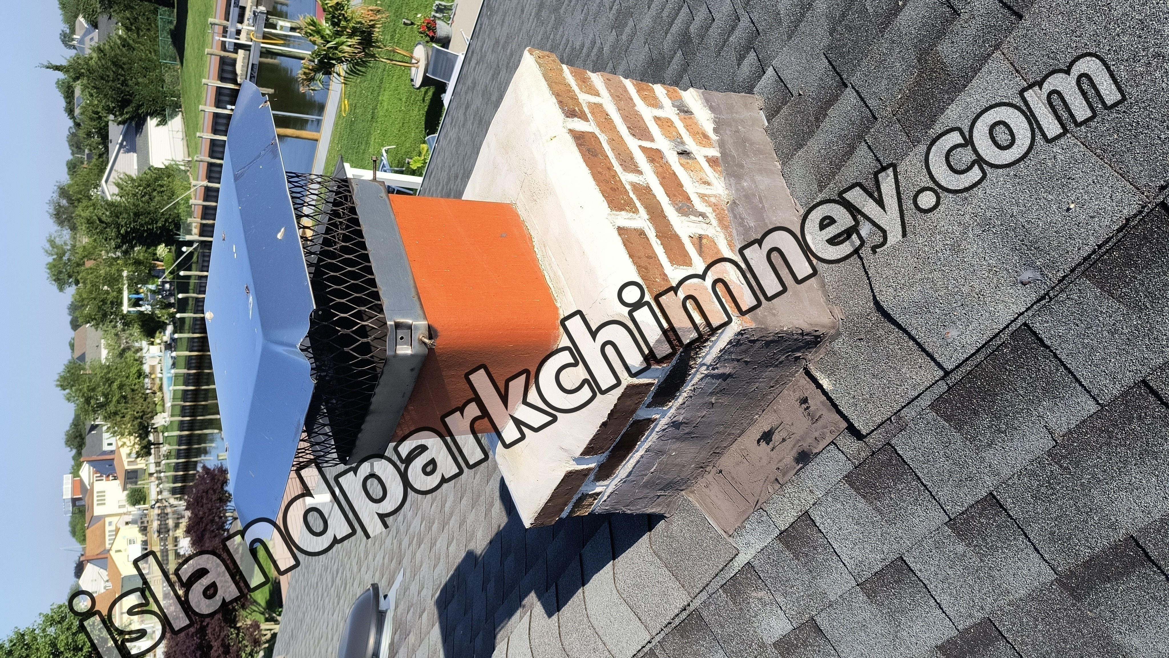Full chimney masonry rebuild and restoration in Island Park, NY